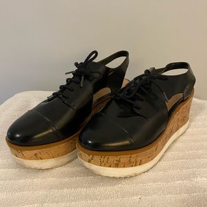 Schutz black platform shoes